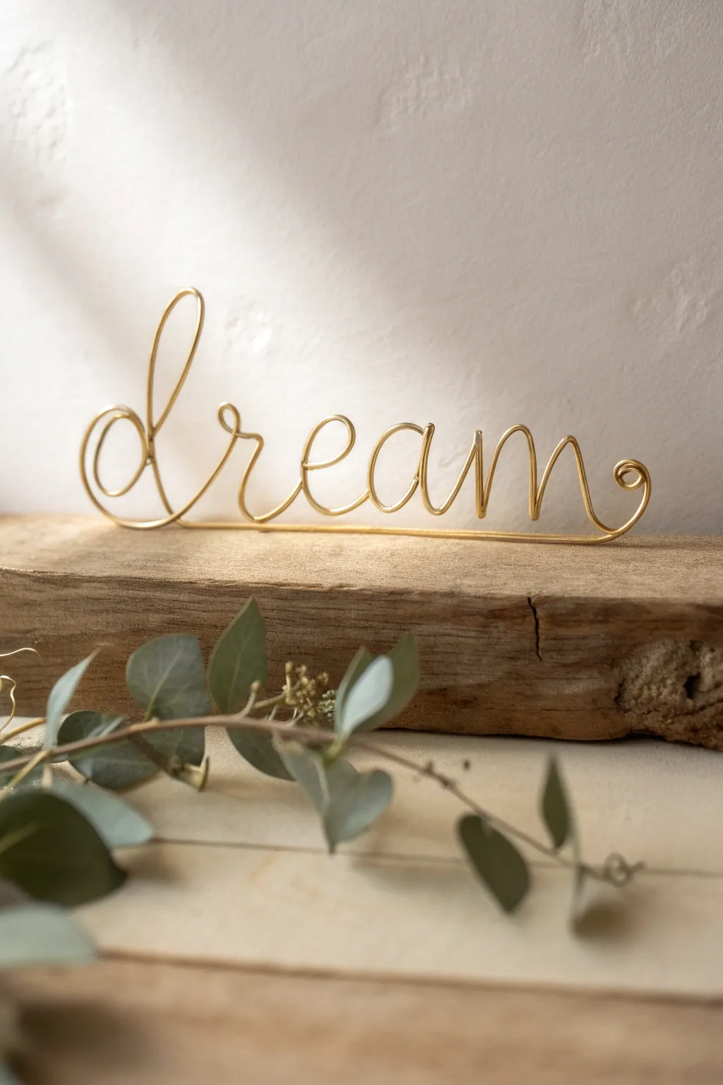 Embrace simplicity and elegance with this beautiful wire word art—'Dream' your way to a serene space.