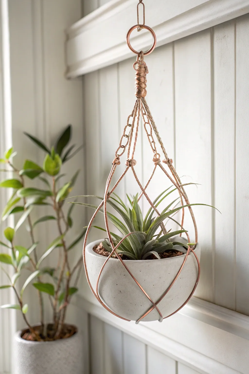 Elevate your greenery with a touch of elegance: Discover the art of wire wrapped planters.