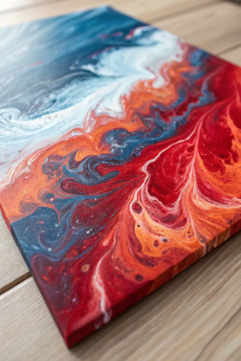 Witness the captivating dance of Fire and Ice in this mesmerizing acrylic pour painting.