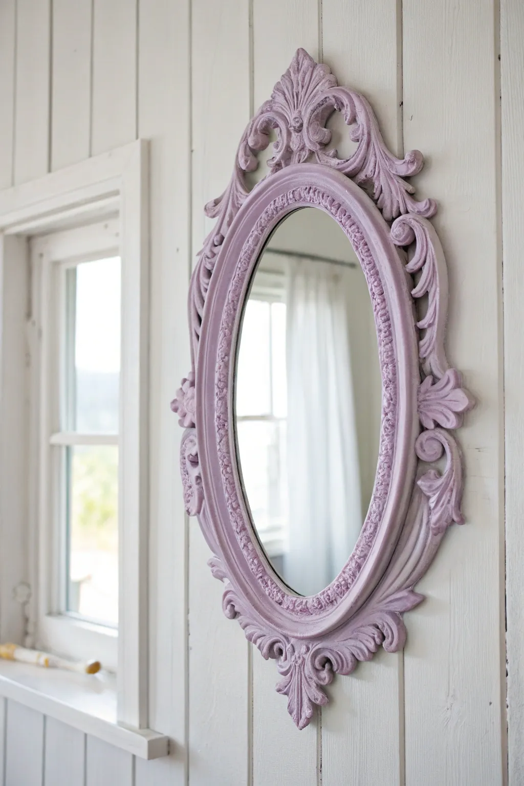 Transform your space with a whimsical touch: a lavender-hued vintage mirror frame brings effortless beauty to minimalist decor.