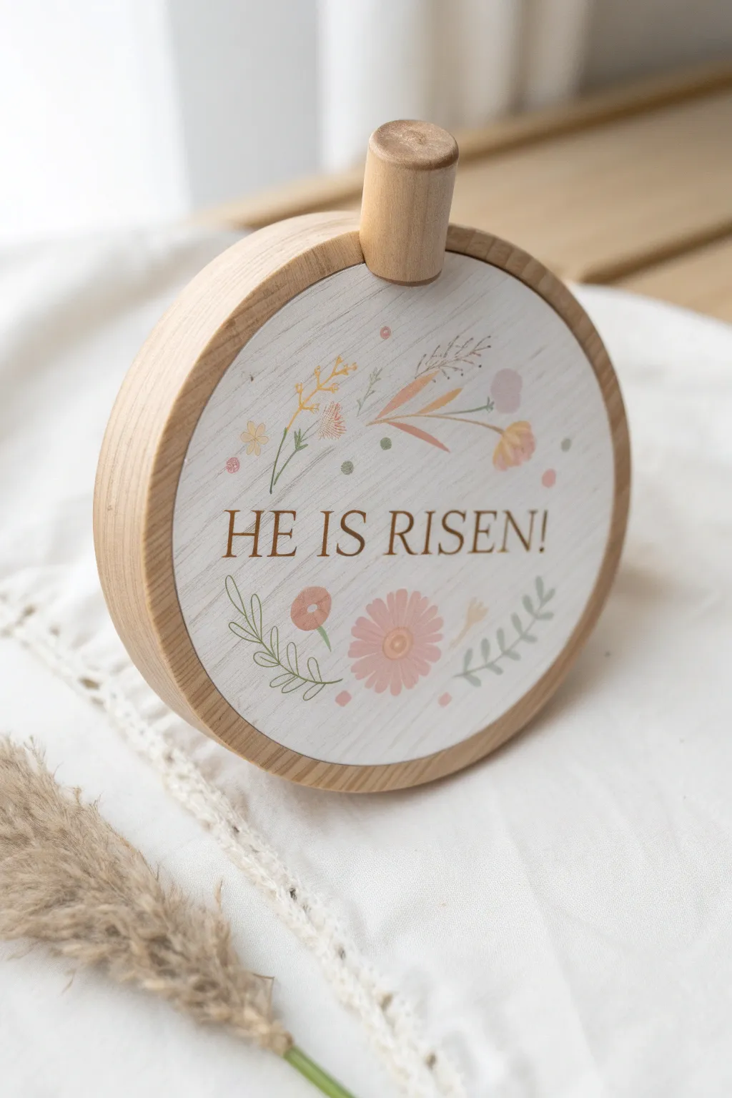 Celebrate Easter with a charming 'He is Risen' spinner craft, blending simplicity and elegance in true Scandinavian style.