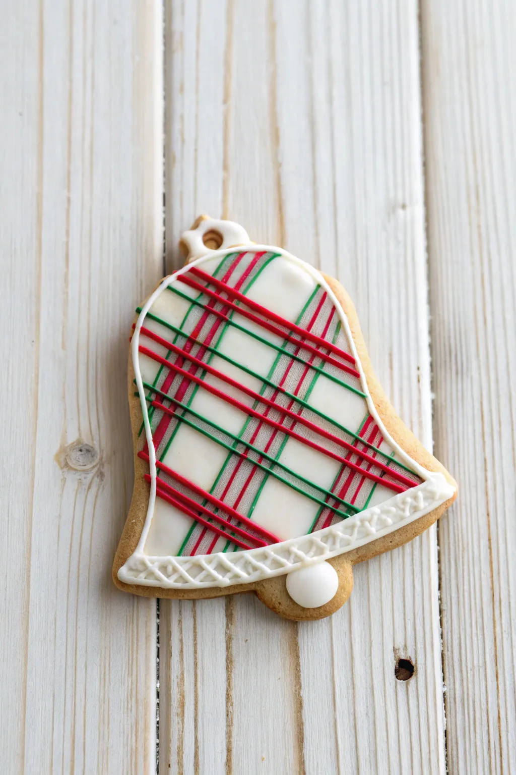 Plaid Perfection: Cozy Christmas Bell Cookie for a Rustic Holiday