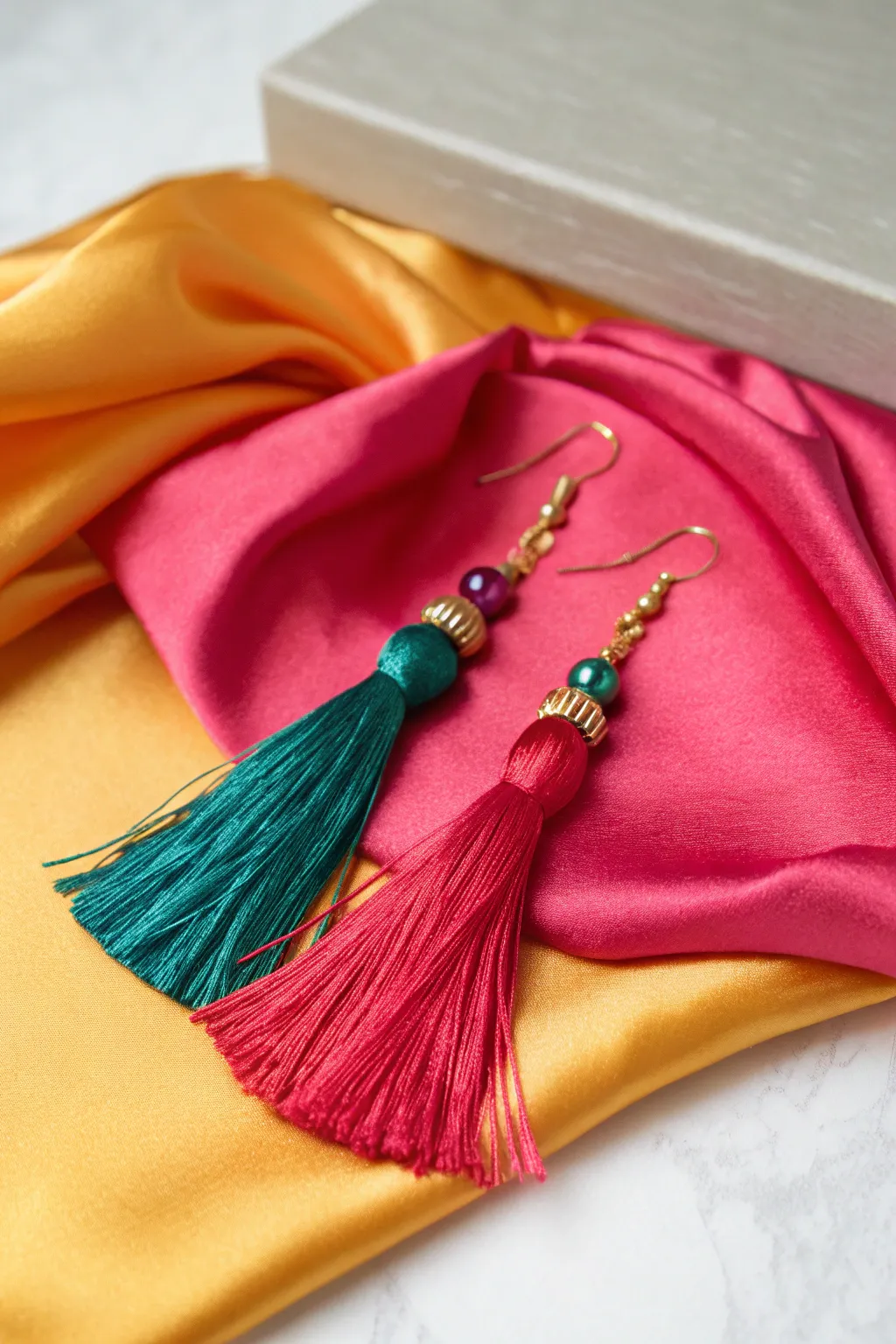Statement tassel earrings that add vibrant movement to your style.