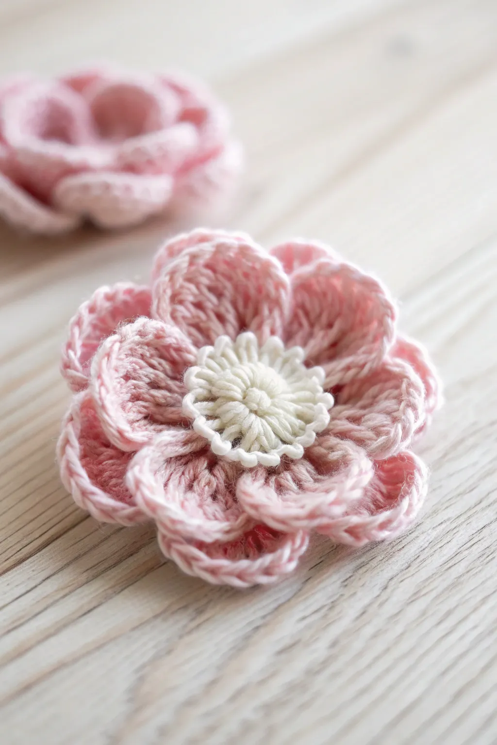 Embrace the subtle elegance of handcrafted crochet anemones, where simplicity meets natural beauty.