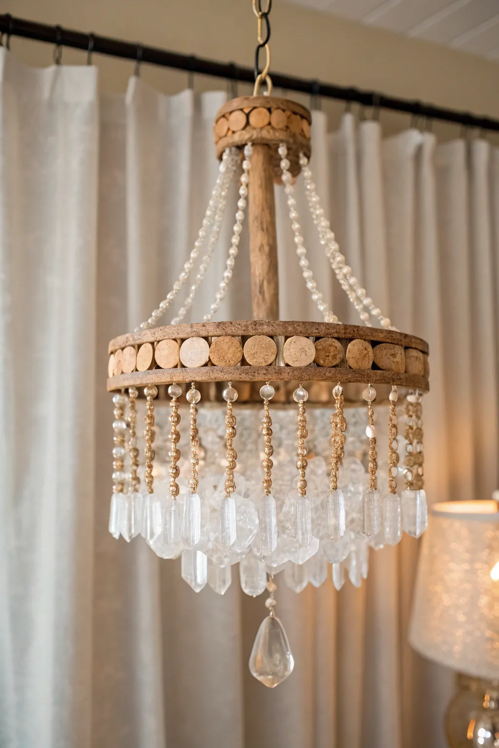 Illuminate your space with eco-friendly elegance: A crystal and cork chandelier that blends simplicity with natural beauty.