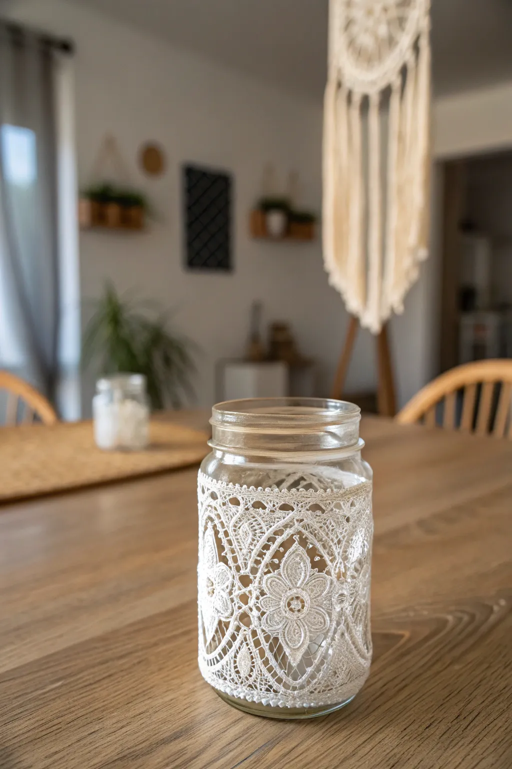 Embrace timeless elegance with vintage lace-adorned mason jars for your baby shower centerpiece!