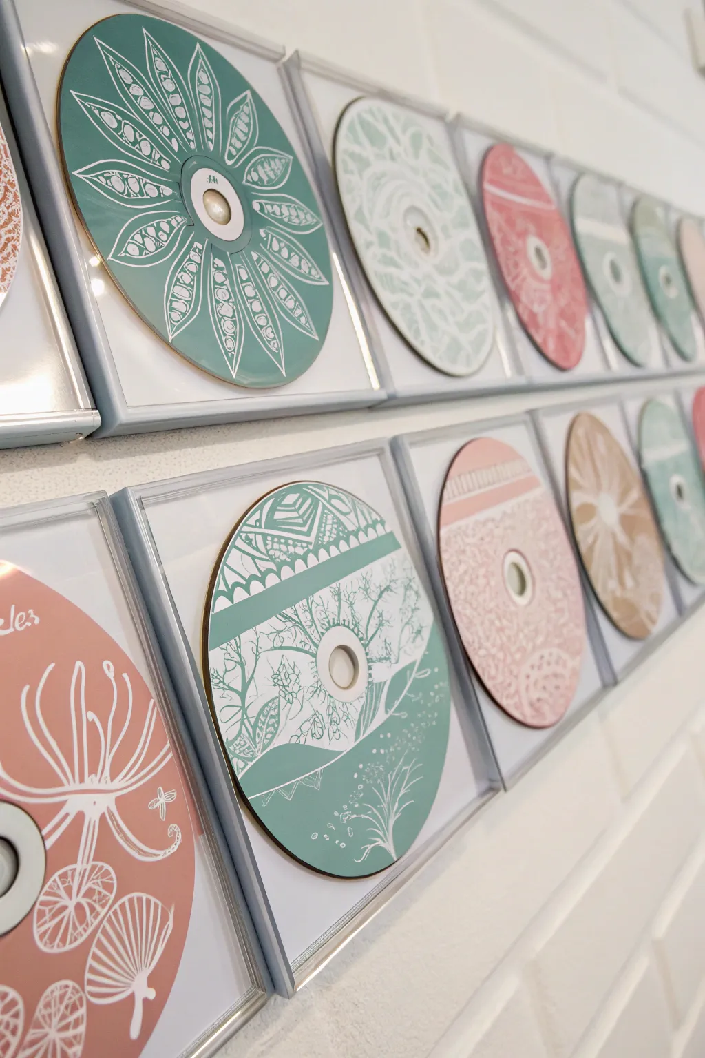 Transform your walls with artfully themed DVD collections that capture minimalist elegance and bohemian flair.
