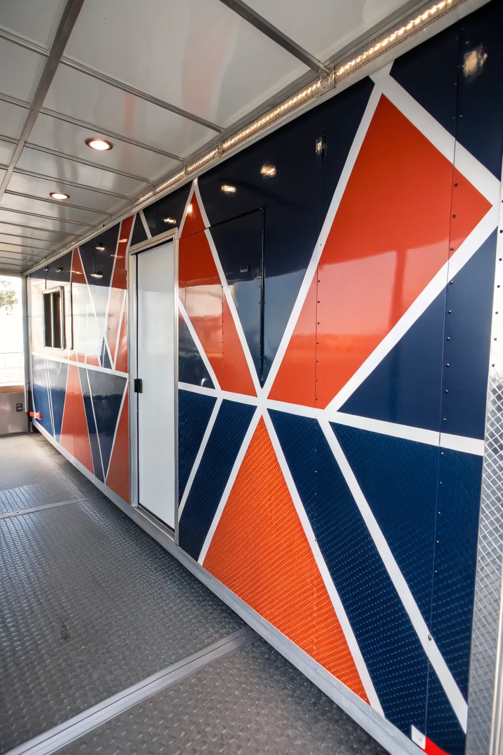 Transform your trailer's interior with bold geometric patterns for a striking and artistic flair.