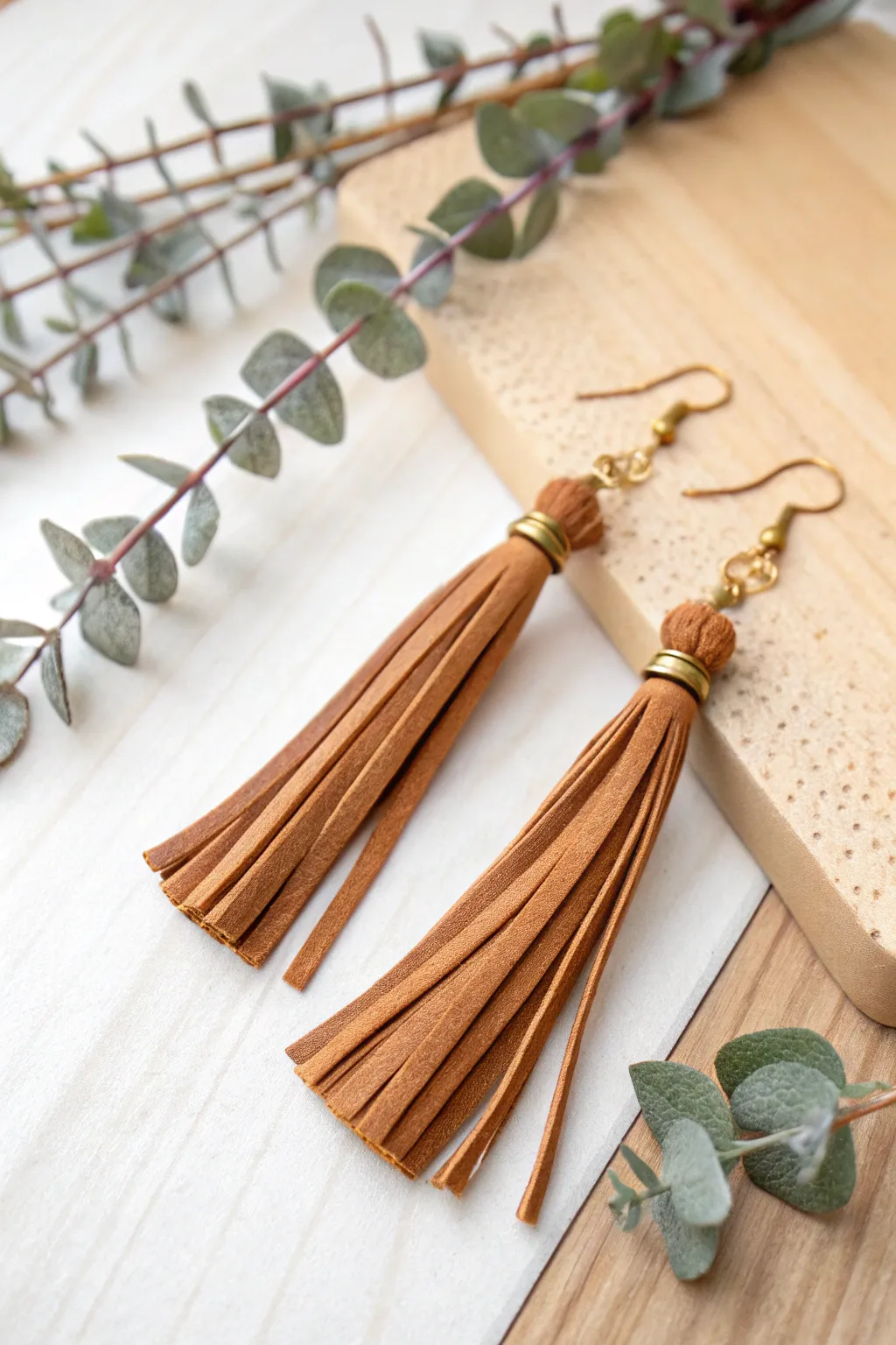 Elevate your style with these handcrafted leather tassel earrings - where boho meets minimalism.