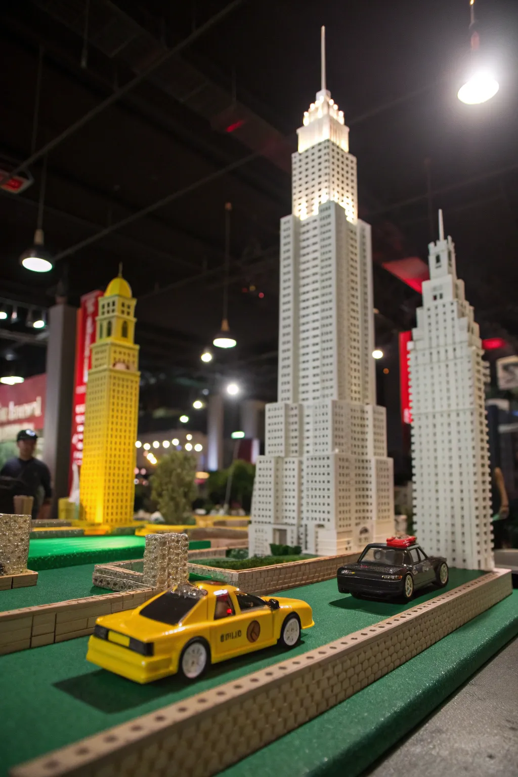 Transform your mini golf game into a cityscape adventure with Lego skyscrapers and toy cars.
