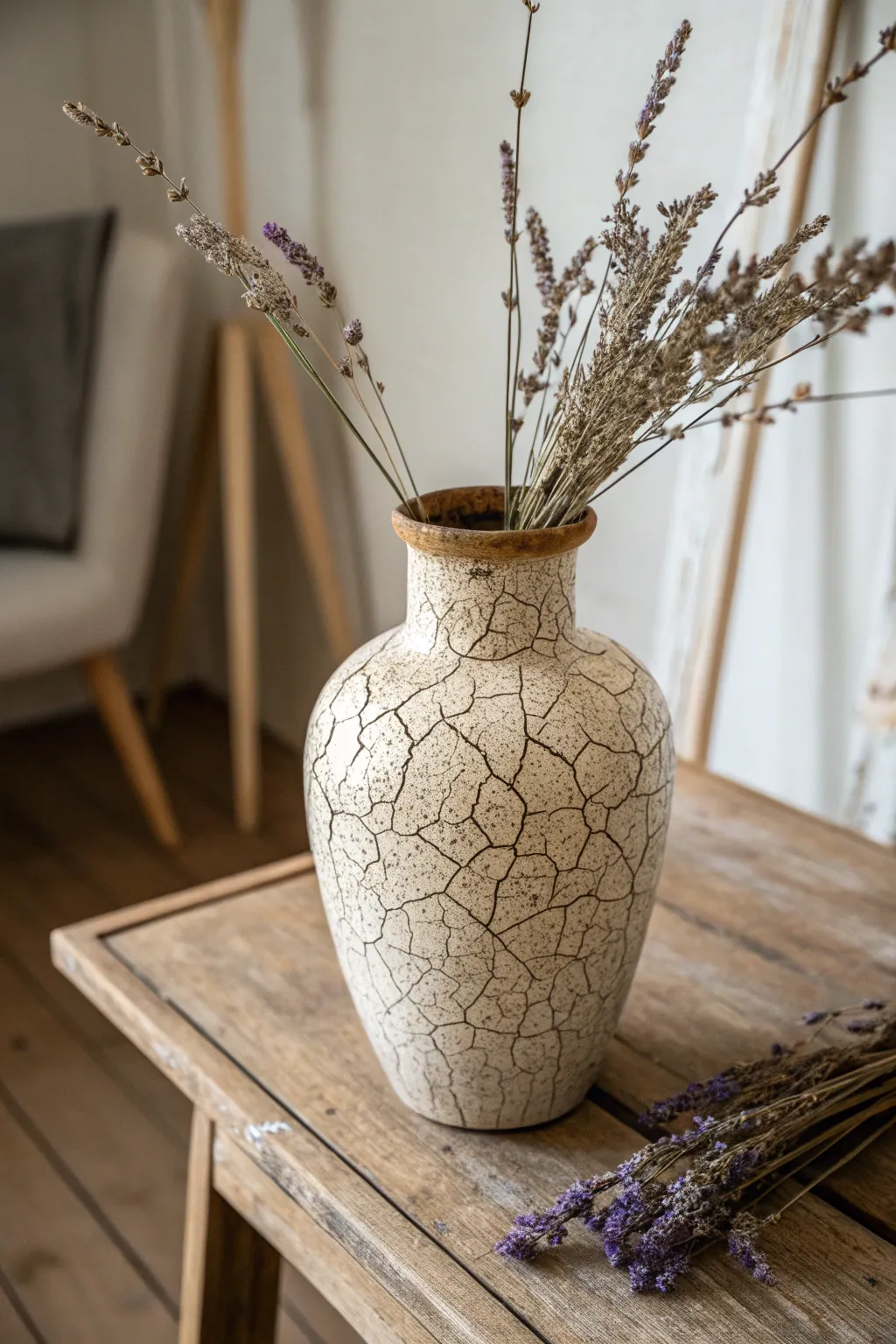 Embrace vintage charm with crackle paint for a timeless vase transformation.