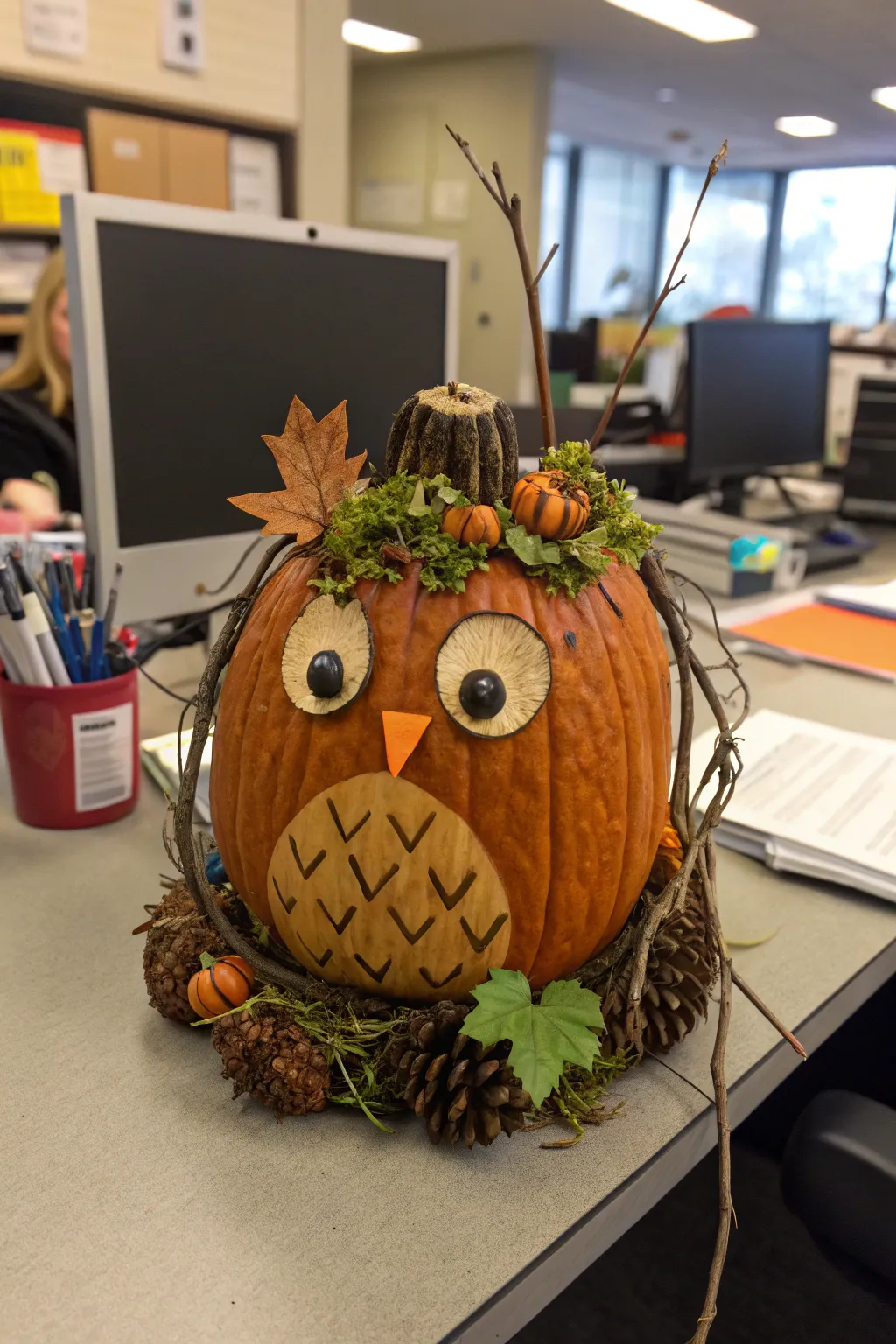 Nature-inspired woodland creature pumpkins, adding outdoor charm to the office.