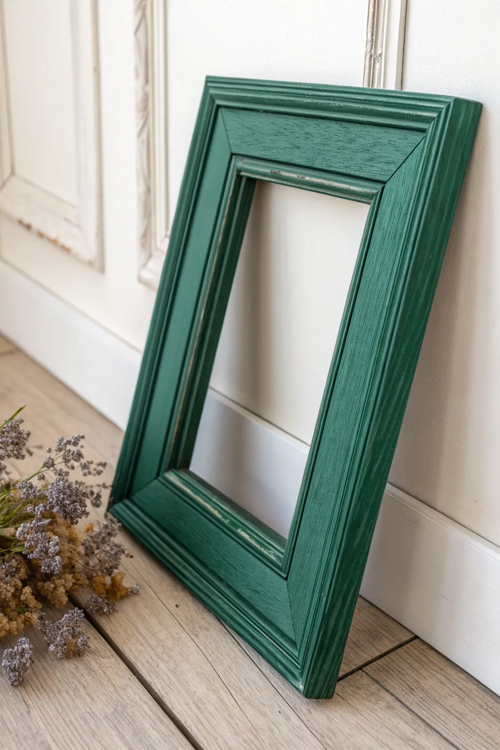Transform your space with a touch of vintage elegance: deep emerald tones meet minimalist design.