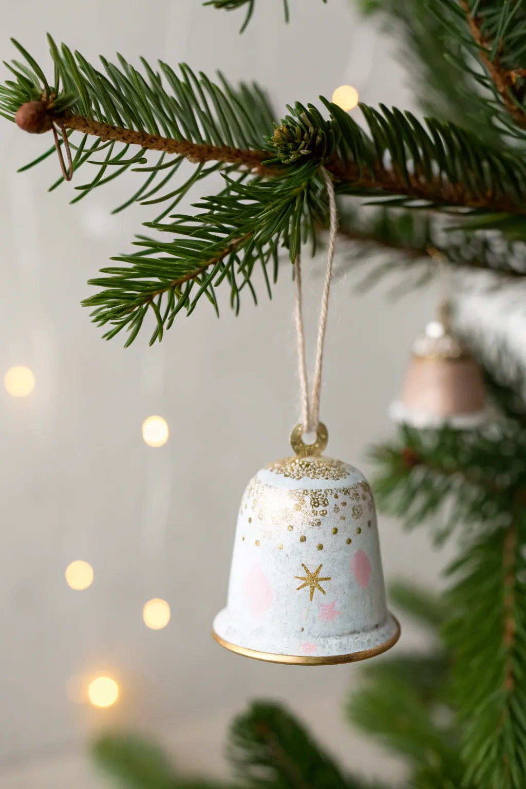 Transforming coffee pods into charming holiday ornaments adds a touch of homemade elegance to your festive decor.