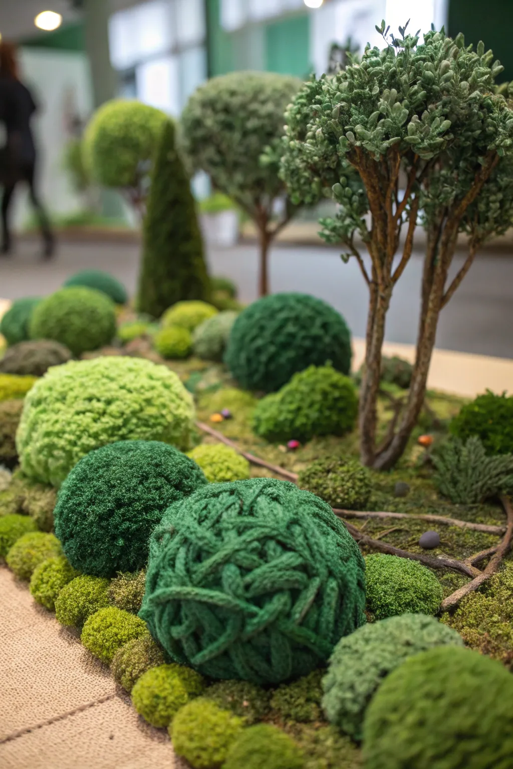 Transform your safari diorama with these lush yarn and felt bushes, perfect for adding a natural touch.