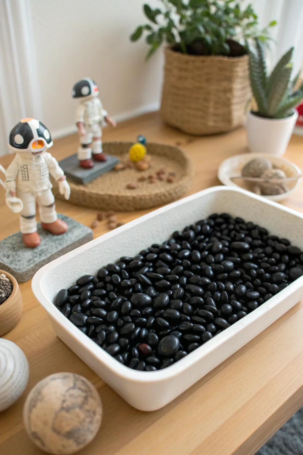Journey through the stars with this minimalist space-themed sensory bin. ✨🚀 #SpaceOdyssey #SensoryPlay #ScandiBoho