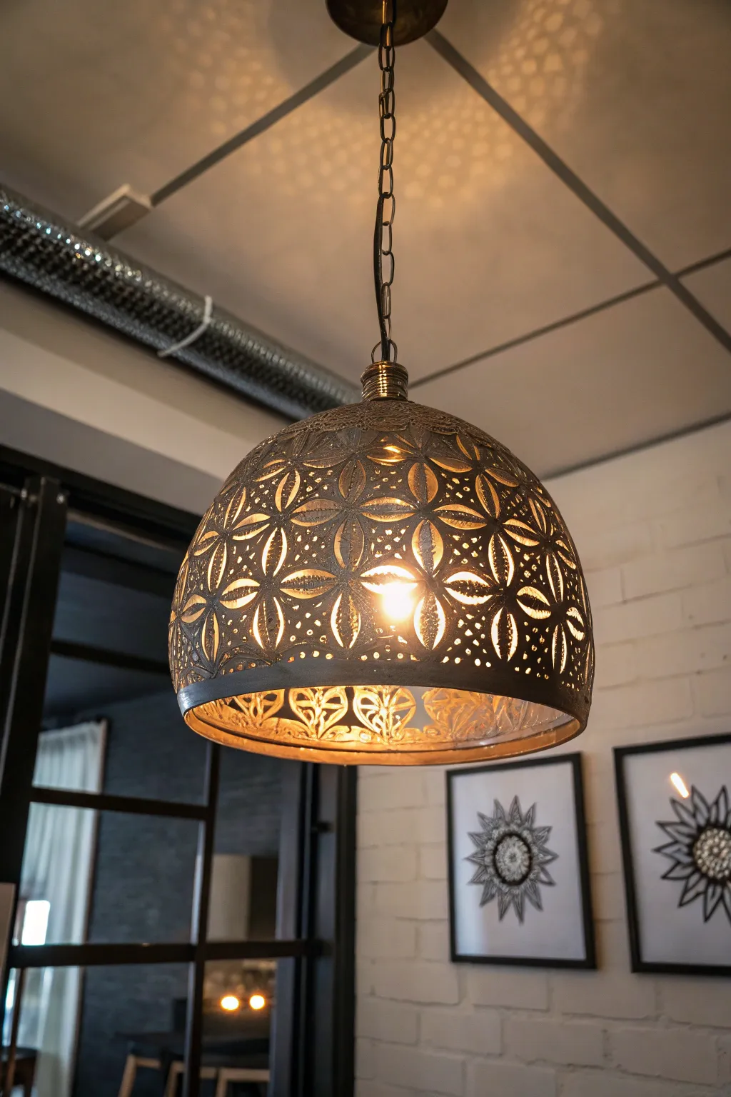 Illuminate your space with a touch of industrial charm using a steel reactive target pendant light.