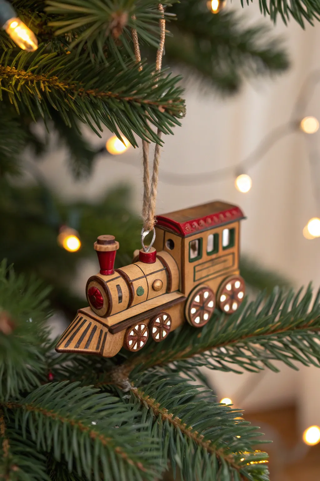 Add a touch of nostalgia to your holidays with handcrafted wooden train ornaments.