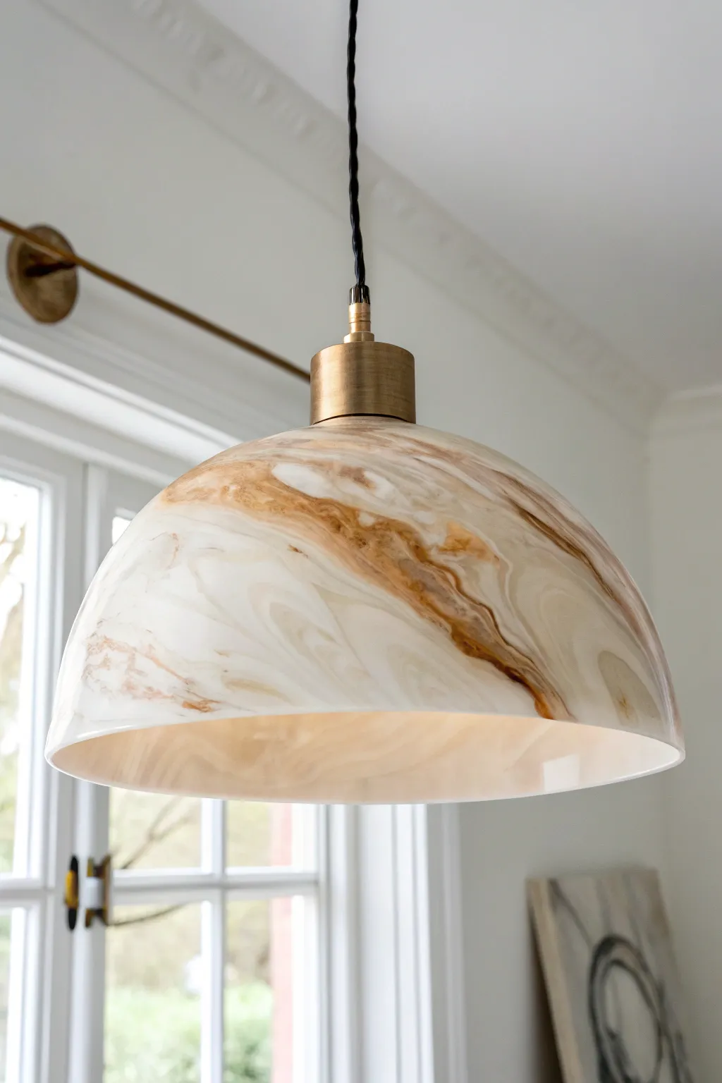 Illuminate your space with the natural elegance of a resin light fixture.