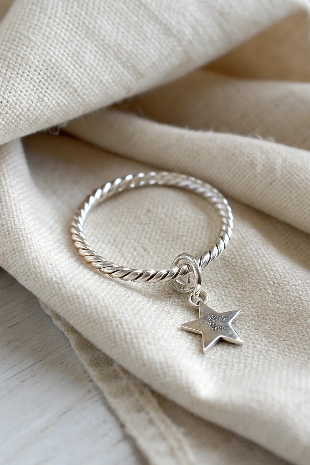 Carry a piece of the night sky with you—adorn your ring with a playful star charm for a touch of whimsical elegance.