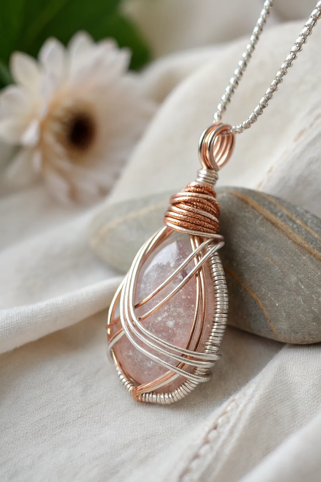 Discover the art of layering with this multi-dimensional wire-wrapped pendant, perfect for adding depth and elegance to your style.